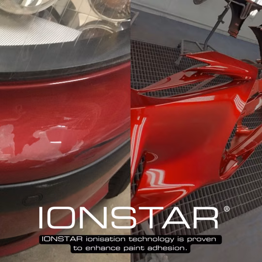 Red vehicle with a plastic bumper